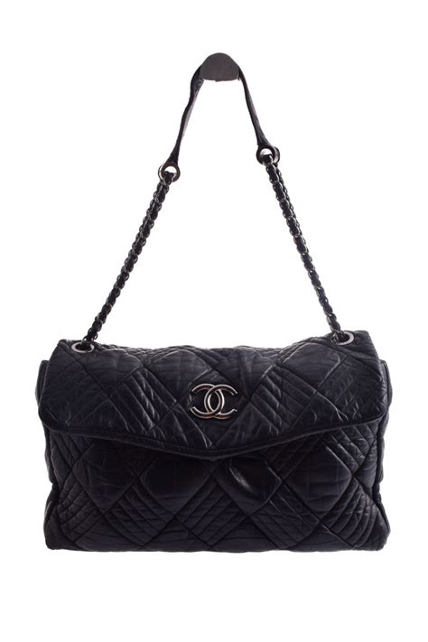 chanel in and out maxi flap bag